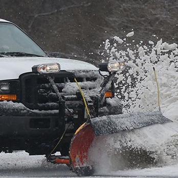 K&S Lawn Maintenance - a snow plow clearing a street - Landscaping Near Me K&S Lawn Maintenance - a snow plow clearing a street - Landscaping Near Me