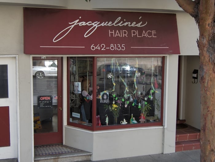 Jacqueline's Hair Place Logo