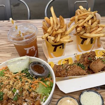 Starbird Chicken - thai chicken salad, iced peach tea, and thai chicken tender... - Chicken Shop Near Me - Pleasanton, California Starbird Chicken - thai chicken salad, iced peach tea, and thai chicken tender... - Chicken Shop Near Me - Pleasanton, California