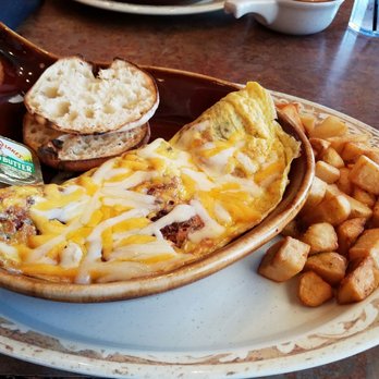 Another Broken Egg Cafe - Bacon, sausage, and cheese omelette. - Breakfast & Brunch Near Me - Panama City Beach, Florida Another Broken Egg Cafe - Bacon, sausage, and cheese omelette. - Breakfast & Brunch Near Me - Panama City Beach, Florida