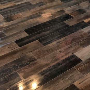 J&E Tile and Flooring - a closeup of a wood floor - Flooring Near Me - Tuscaloosa, Alabama J&E Tile and Flooring - a closeup of a wood floor - Flooring Near Me - Tuscaloosa, Alabama