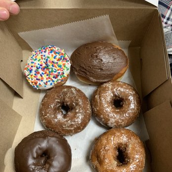Bill's Donut Shop - Double chocolate, apple sauce, pumpkin, whole wheat, cream filled with chocolate icing, and vanilla with rainbow sprinkles - Donuts Near Me - Centerville, Ohio