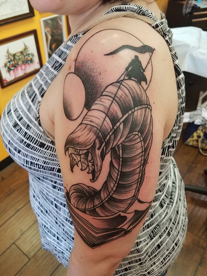 Wanderlust Tattoo Logo