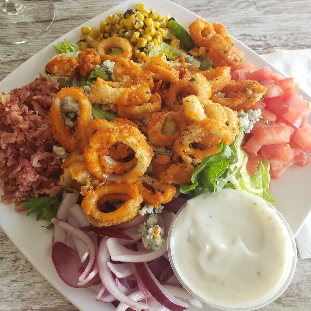 The Courtyard Cafe - Buffalo calamari salad - Pizza Near Me - Brecksville, Ohio The Courtyard Cafe - Buffalo calamari salad - Pizza Near Me - Brecksville, Ohio