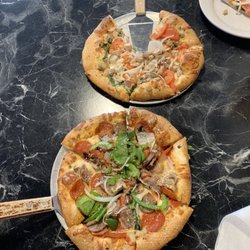 Nina’s Pizza Kitchen - "The Works" and "Florentine" pizzas