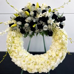 Elegant preserved sympathy flowers in Raleigh. Handcrafted tributes with lasting beauty, compassion, and white-glove service when words fall