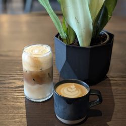 Metropolis Mercantile + Cafe - Iced Latte with Honey Cold Foam & Flat White