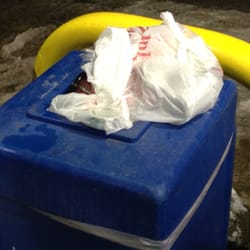 Marathon Gas - No time to empty the garbage, but they're smoking, not just in front of the store, but in their truck.