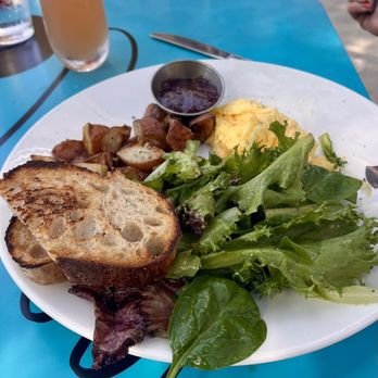 Avalon Cafe And Kitchen - Ann Arbor - Eggs and Toast, with fresh jam, roasted red potatoes and dressed greens. - Cafes Near Me - Ann Arbor, Michigan