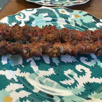 Bostan - skewered meat on a plate on a table - Chinese Near Me - Herndon, Virginia