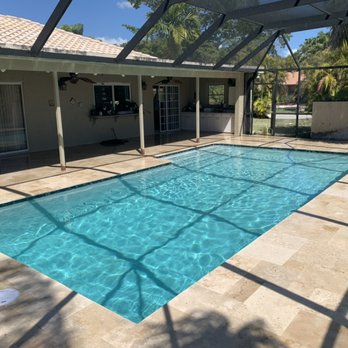 Bluewater Pools - Bluewater water blue with ivory travertine - Pool & Hot Tub Service Near Me - Port Saint Lucie, Florida Bluewater Pools - Bluewater water blue with ivory travertine - Pool & Hot Tub Service Near Me - Port Saint Lucie, Florida