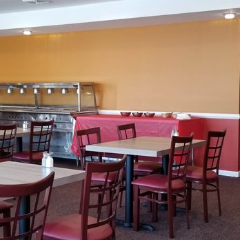 Star Halal - a restaurant with tables and chairs - Indian Near Me - Schenectady, New York