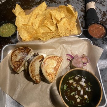 The Local - bao bun birria appetizer, Chips and Salsa - Mexican Near Me - Abilene, Texas The Local - bao bun birria appetizer, Chips and Salsa - Mexican Near Me - Abilene, Texas