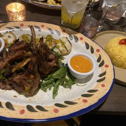 Casa Valijo - Lamb Chops, Potatoes, and Yellow Rice.