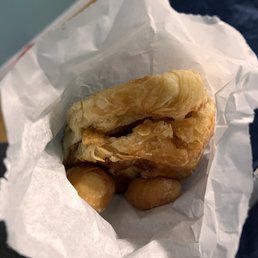 Breakfast combo sandwich: egg, cheese, bacon, ham 3 free donut holes that the lady included which was nice. Breakfast combo sandwich: egg, cheese, bacon, ham 3 free donut holes that the lady included which was nice.