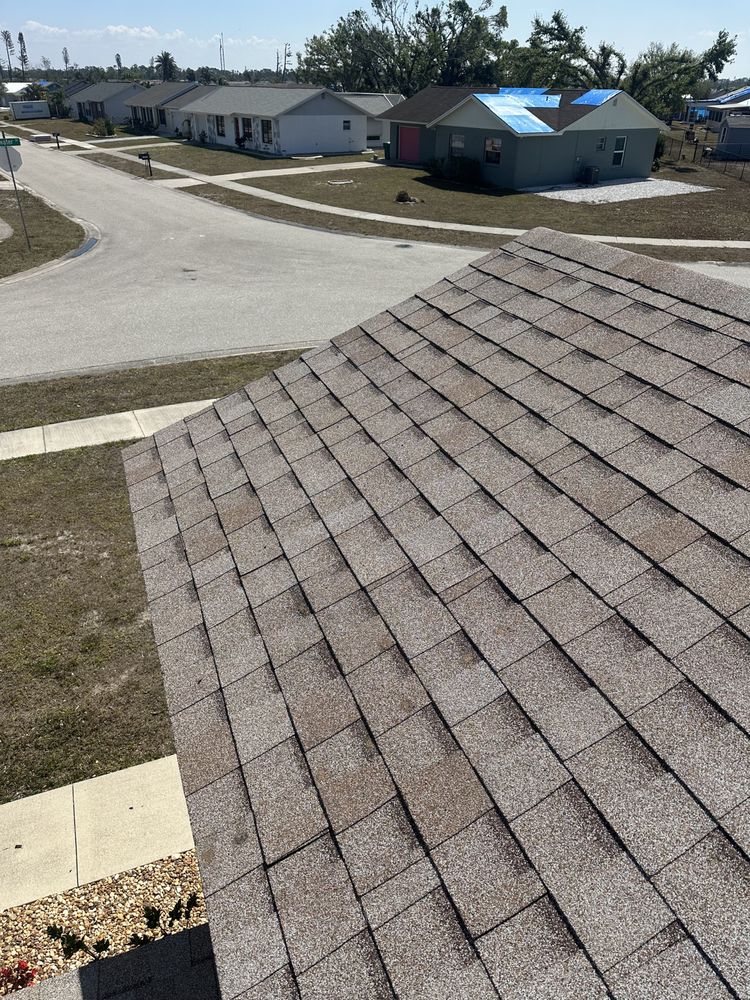 Slide of New Vallee Roofing