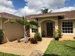 Slide of St Lucie Roofing