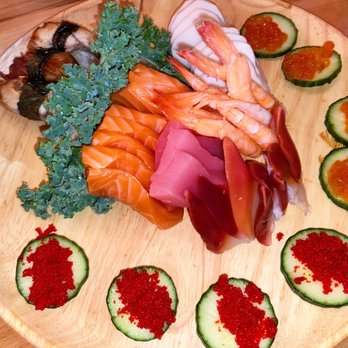 Akino - Shrimp Salmon Eel Avocado Roll - Sushi Bars Near Me - Elmhurst, New York Akino - Shrimp Salmon Eel Avocado Roll - Sushi Bars Near Me - Elmhurst, New York
