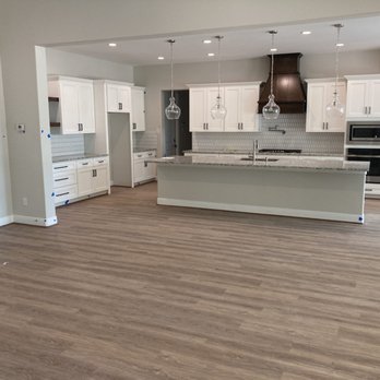 First Continental Construction - kitchen and living room - General Contractors Near Me