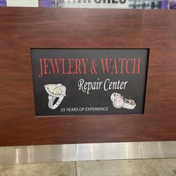 Jewelry and Watch Repair Center - Company sign