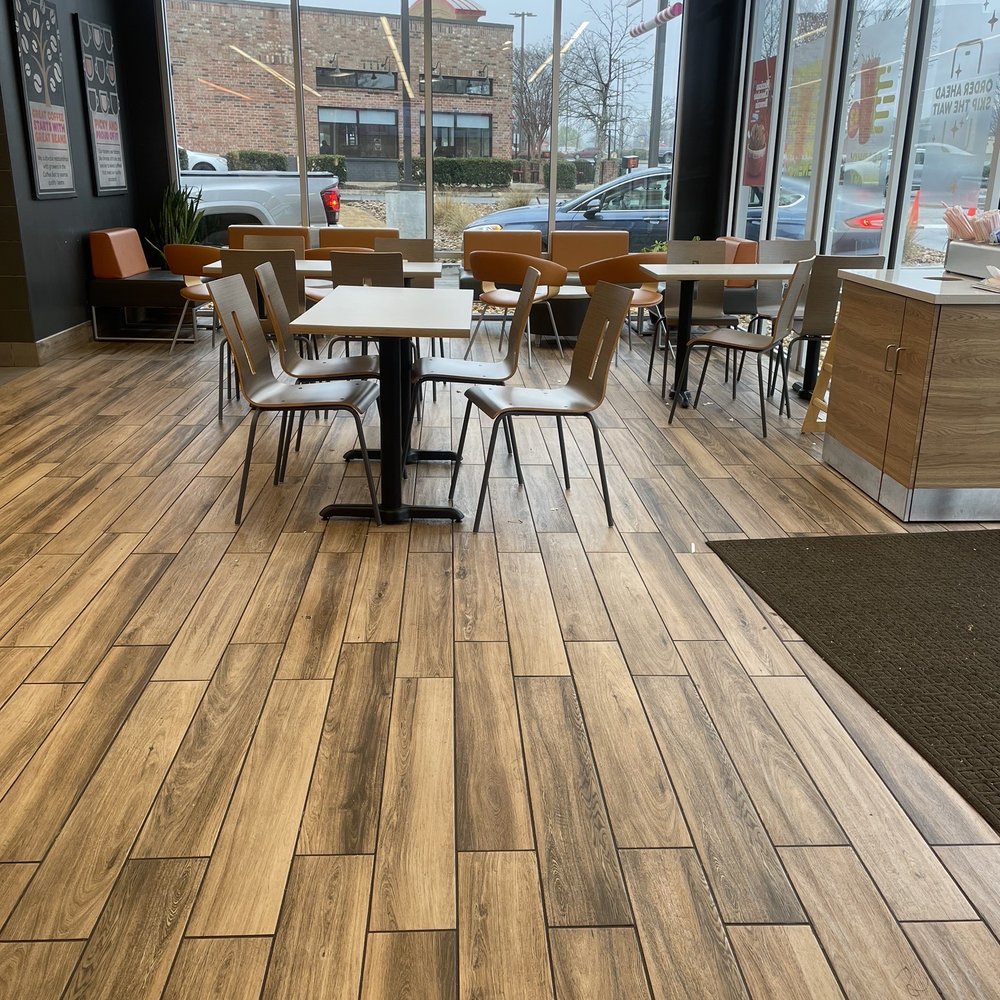 Dunkin' -  a view of a restaurant with tables and chairs - Donuts Near Me - Fayetteville, Georgia