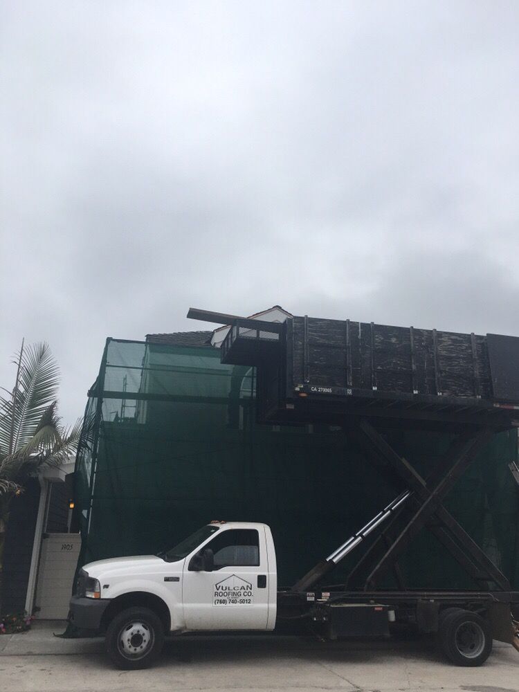 Slide of Vulcan Roofing Co