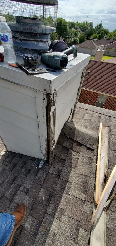 Slide of Truly Roofing & Construction