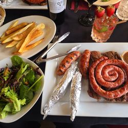 Dicor Italian & Argentinian Restaurant - Parillada Grilled Meat platter: Short Ribs, Black Sausage, Sausage, & Flank Steak. Served with French fries and a mixed Salad.