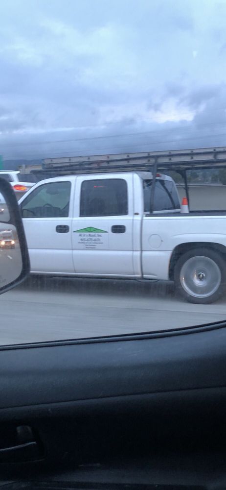 Slide of Al Jr's Roofing