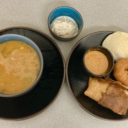 (In my own dishes). Sambhar, coconut chutney, and 1/3 of the dosa, one of the idly, and vada