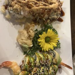 Hurricane roll 10/10 on the left & dragon roll 5/10 on the right Hurricane roll 10/10 on the left & dragon roll 5/10 on the right