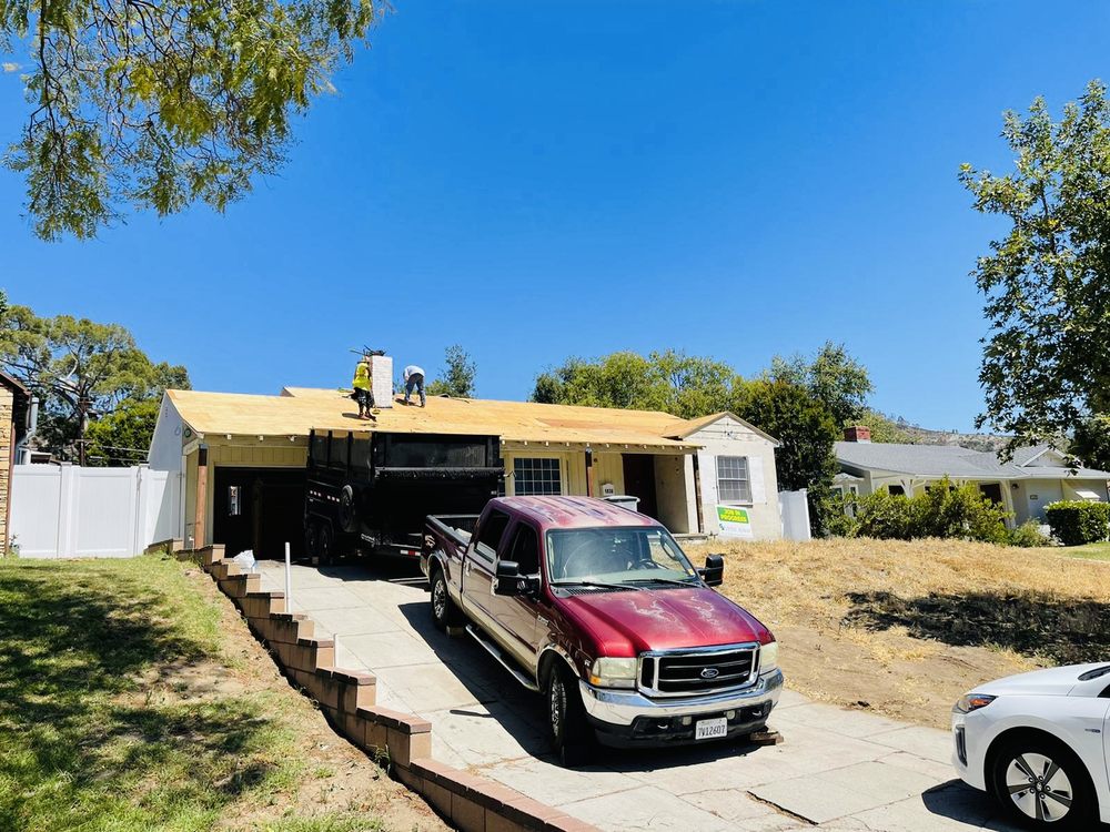 Slide of Almighty Roofing