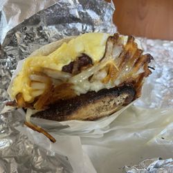 Bacon egg hash browns and cheese on a large English muffin. $6.95! Excellent!
