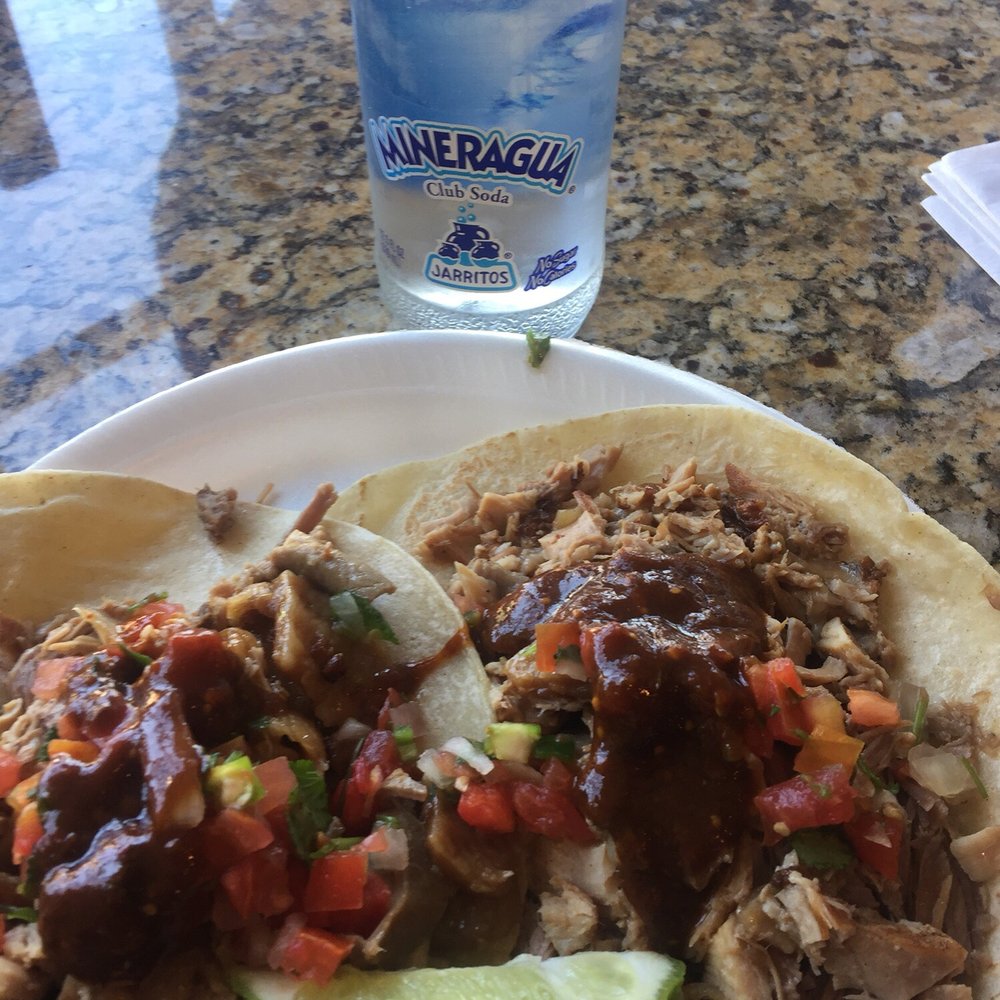 Carnitas El Rey - Carnitas mixta (carnitas, buche and cueritos) with a mineral water. The red salsa is good and not spicy at all. - Tacos Near Me - Oxnard, California Carnitas El Rey - Carnitas mixta (carnitas, buche and cueritos) with a mineral water. The red salsa is good and not spicy at all. - Tacos Near Me - Oxnard, California