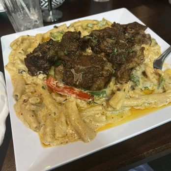 Oko Fine Cuisine - Oxtail Rasta Pasta - African Near Me - West Orange, New Jersey Oko Fine Cuisine - Oxtail Rasta Pasta - African Near Me - West Orange, New Jersey