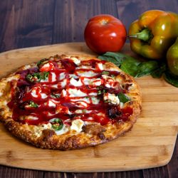 Capitol Pizza - Garlic butter, cream cheese, jalapenos, bacon, topped with raspberry sauce