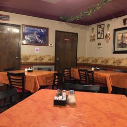 Tables in the back of the restaurant. Tables in the back of the restaurant.