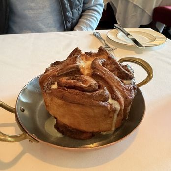 The Village Pub - Cinnamon roll with passion fruit frosting - Pubs Near Me - Woodside, California The Village Pub - Cinnamon roll with passion fruit frosting - Pubs Near Me - Woodside, California