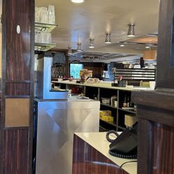 Back view of dining area where individual guest gather. Taken from booth I was sitting in