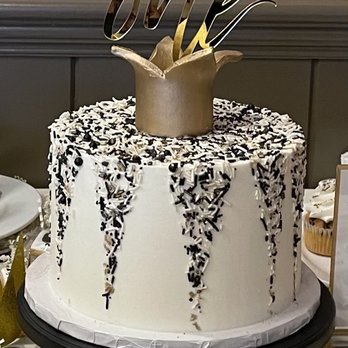 Just-Delight-Full - ows a white cake with black and white sprinkles - Cupcakes Near Me - Howard Beach, New York Just-Delight-Full - ows a white cake with black and white sprinkles - Cupcakes Near Me - Howard Beach, New York