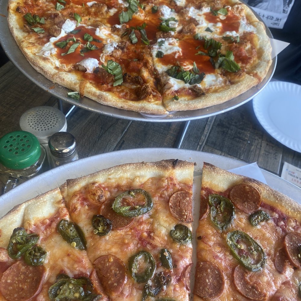 Pizzanada - Chicken Parm Pizza (in the back...regular not vegan) - Empanadas Near Me - Bloomfield, New Jersey Pizzanada - Chicken Parm Pizza (in the back...regular not vegan) - Empanadas Near Me - Bloomfield, New Jersey