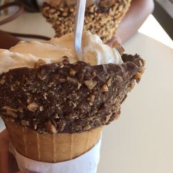 Butter pecan ice cream with walnuts and pecan .