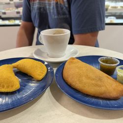 Tu Bunuelo - Beef empanadas on the left and a cheese empanada on the right