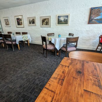 Saratoga Grill - a dining room with tables and chairs - American Near Me - Hillsborough, North Carolina Saratoga Grill - a dining room with tables and chairs - American Near Me - Hillsborough, North Carolina