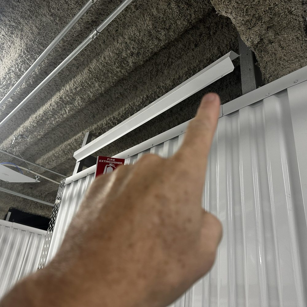 Removed bolt of barrier allowing access to via top of unit