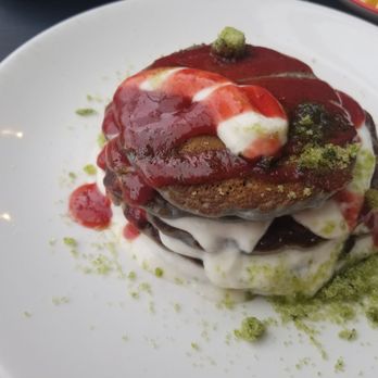 Streetpecker - Charcoal Pancakes with strawberry sauce and lime cream cheese. - Breakfast & Brunch Near Me - Brussels, BRU Streetpecker - Charcoal Pancakes with strawberry sauce and lime cream cheese. - Breakfast & Brunch Near Me - Brussels, BRU