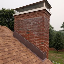 Hearthstone Chimney Services - Partial brick rebuild and custom cap