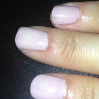 Delicate Nails & Spa - Dust on the index and middle finger with layered nail polish - Nail Salons Near Me - Walnut Creek, California