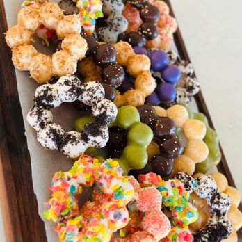 Oki Mochi - a variety of donuts on a cutting board - Juice Bars & Smoothies Near Me - Tulsa, Oklahoma Oki Mochi - a variety of donuts on a cutting board - Juice Bars & Smoothies Near Me - Tulsa, Oklahoma
