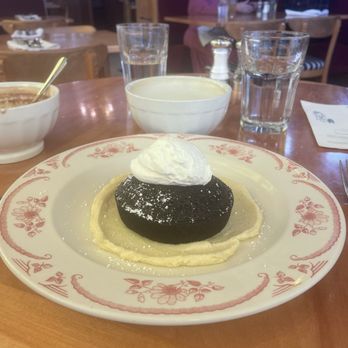 Rose's Cafe - Chocolate cake with whipped cream and crème anglaise - Italian Near Me - San Francisco, California Rose's Cafe - Chocolate cake with whipped cream and crème anglaise - Italian Near Me - San Francisco, California